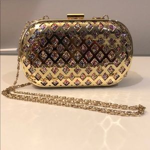 Glittery gold clutch with gold chain